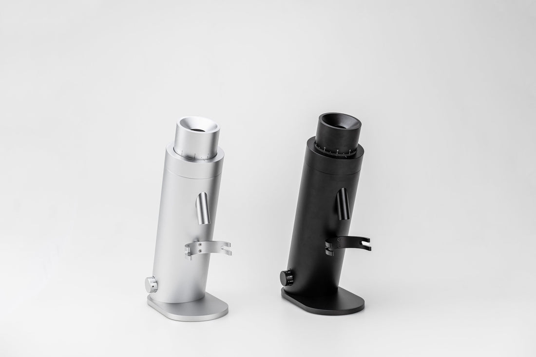 Two Lagom P64 single dosing grinders in silver and black